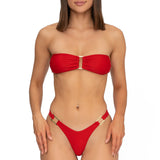 Front view of model wearing scarlet red bandeau Lola bikini top and matching Brazilian cut bikini bottom by Aventura Swimwear.