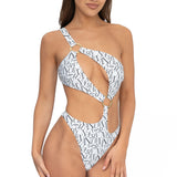 Front view of model wearing white signature print asymmetrical one shoulder Petra onepiece swimsuit by Aventura Swimwear.