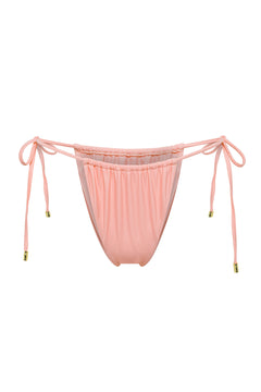 Adjustable peach Mila bikini bottom by Aventura Swimwear. 