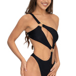 Front view of model wearing midnight black asymmetrical one shoulder Petra onepiece swimsuit by Aventura Swimwear. 