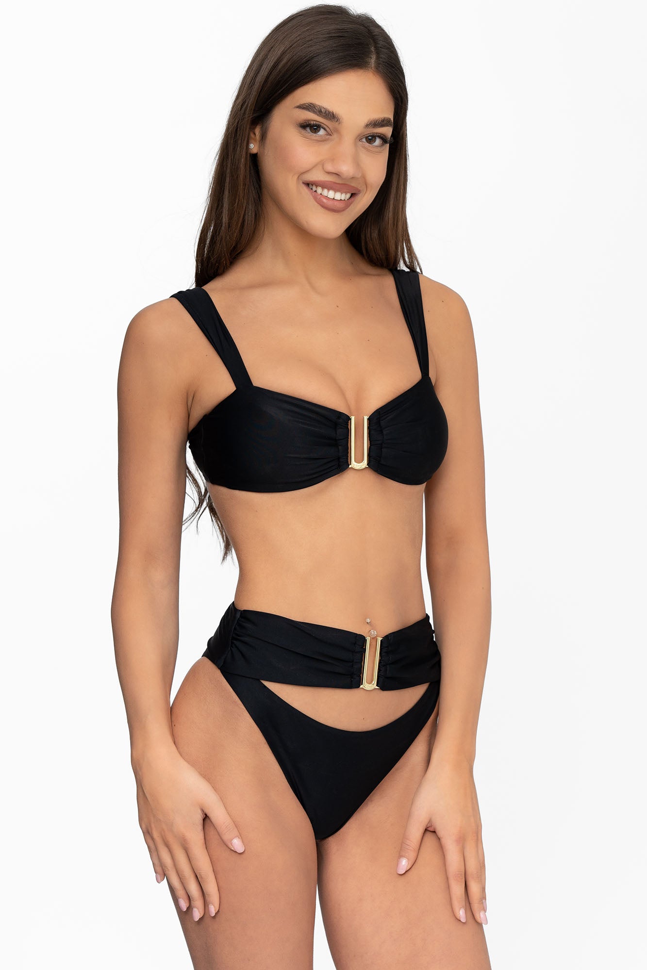 Front view of model wearing obsidian black Seraphina bralette bikini top and matching high waist cheeky cut Seraphina bikini bottom by Aventura Swimwear. 