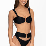 Front view of model wearing obsidian black Seraphina bralette bikini top and matching high waist cheeky cut Seraphina bikini bottom by Aventura Swimwear. 