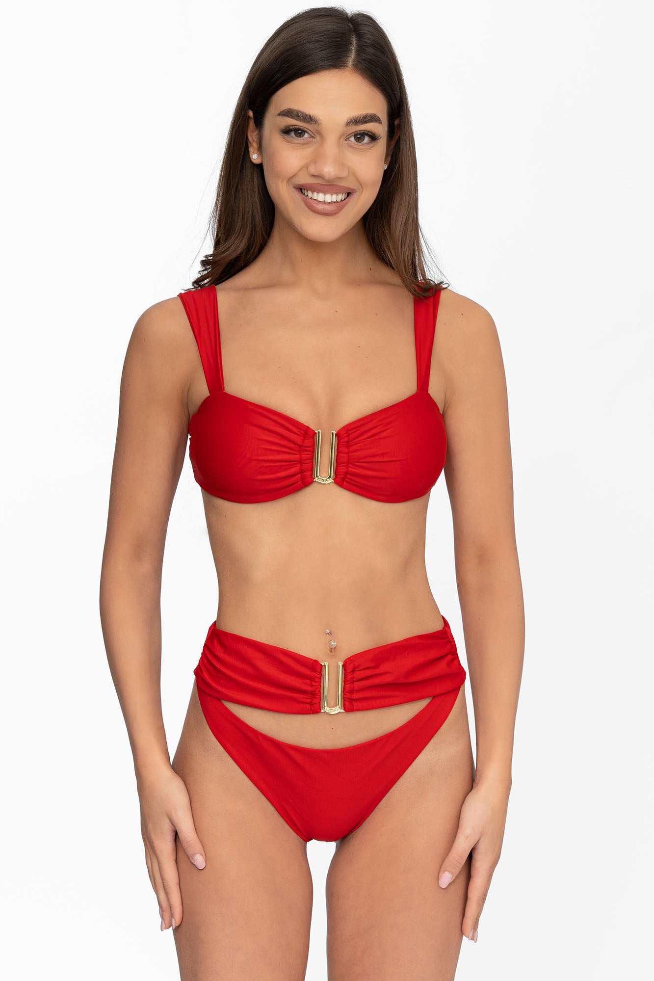 Front view of model wearing ruby red Seraphina bralette bikini top and matching high waist cheeky cut Seraphina bikini bottom by Aventura Swimwear. 